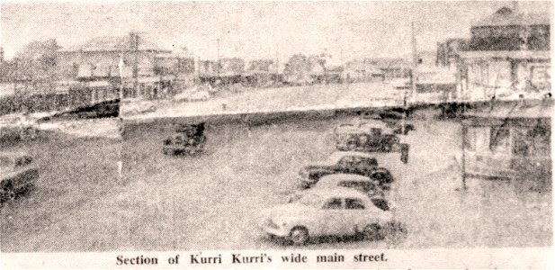 Section of Kurri Kurri, NSW's, wide main street, 1954. - Newcastle Morning Herald and Miners' Advocate photo