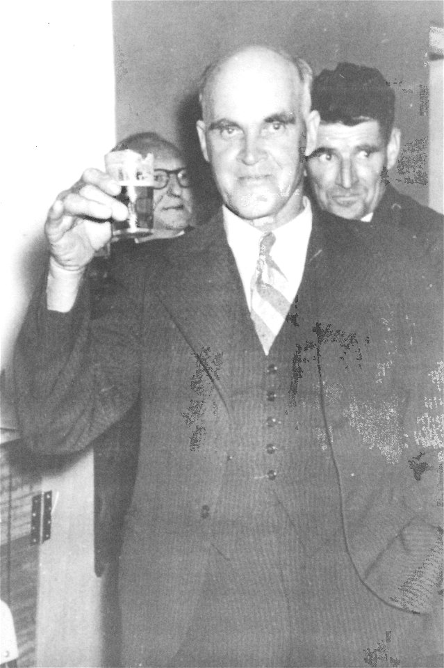 Gentleman raising a toast