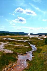 Streams off of Old Faithful (not while erupting) photo