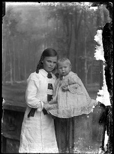 [A girl and a baby, possibly from the Armstrong family, n.d.]