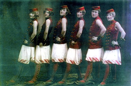 Dancing girls in military costume, [n.d.] photo