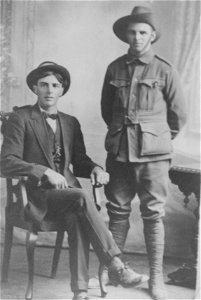 Soldier and a young man photo