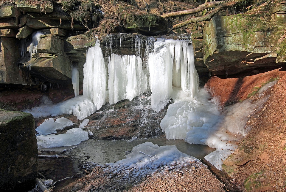 Ice of a frozen waterfall Wartmannsroth Germany photo