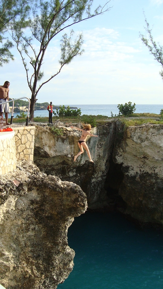 Cliff diving high action
