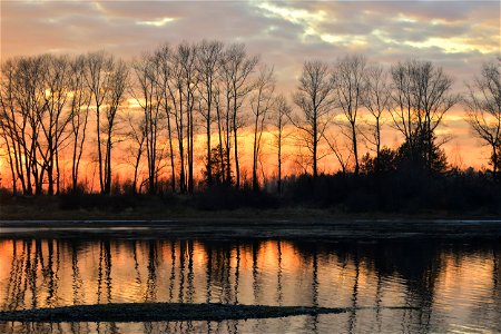 autumn sunset on the river photo