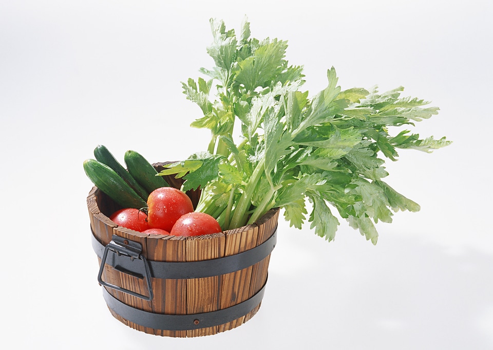 Composition with raw vegetables and basket