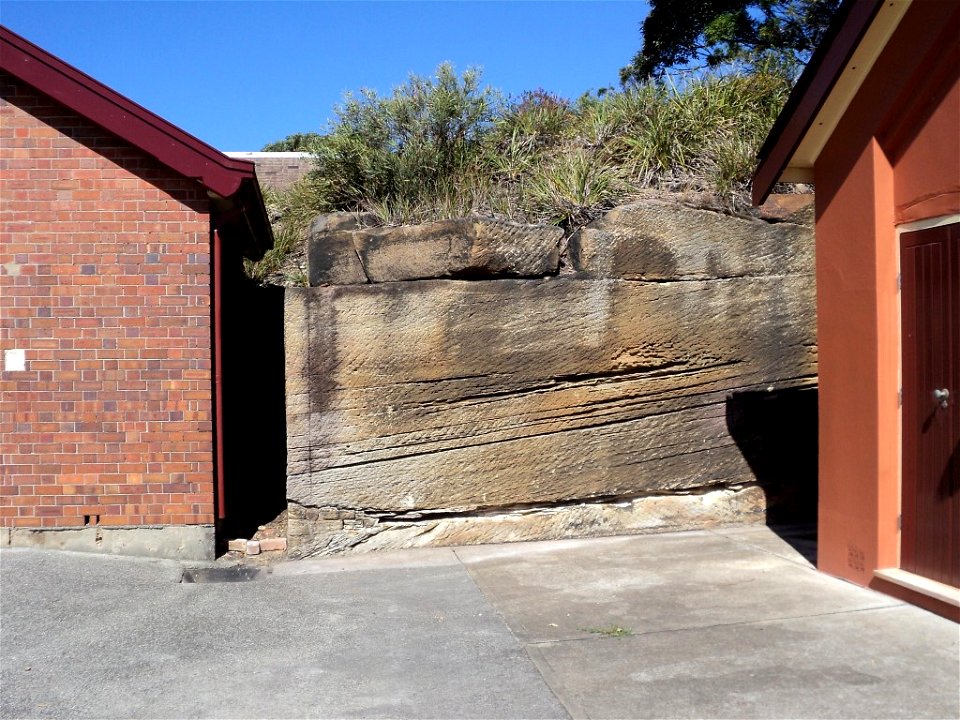 RAN Armament Depot Spectacle Island - Excavated face of residual knoll between the guncotton store (47) and laboratory (48)