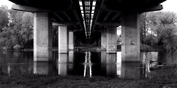 Under the bridge.