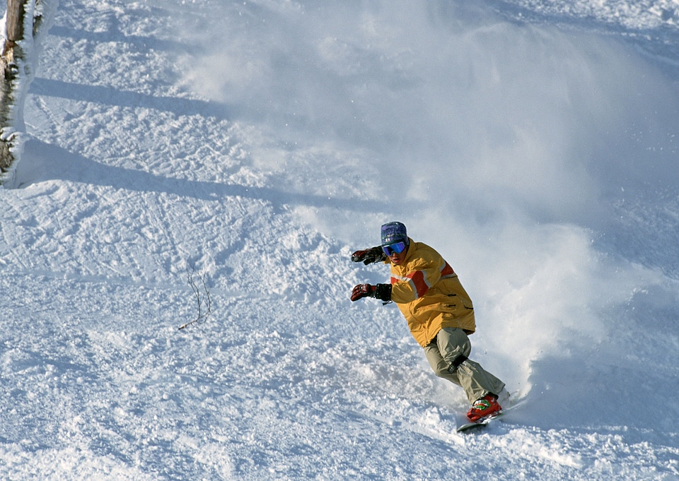 Snowboarder in action at the mountains