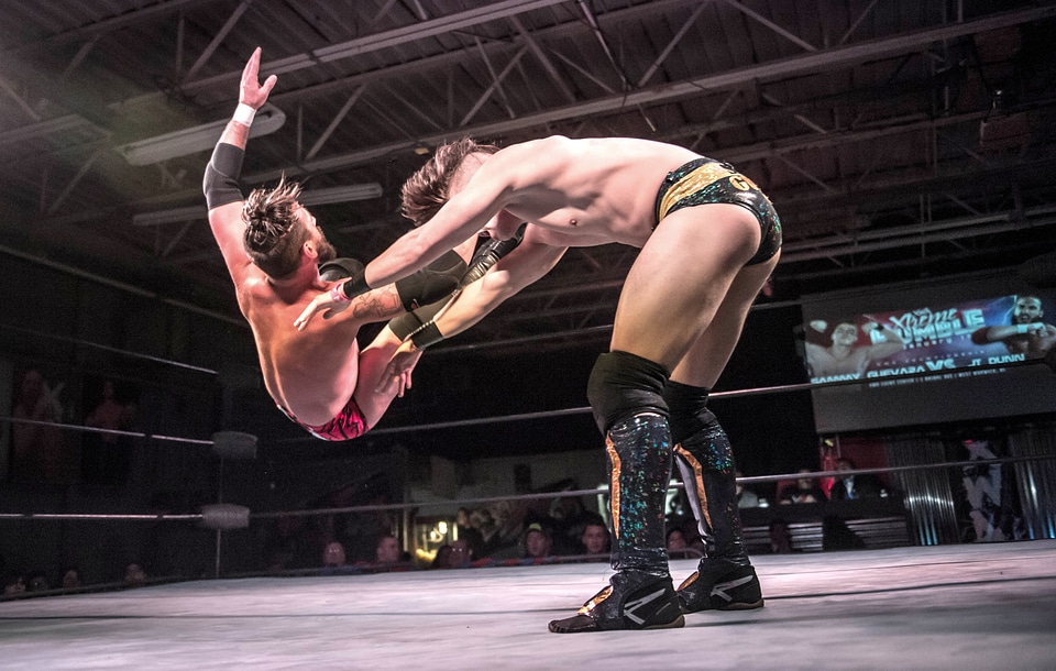 Two Men Battle for Control in Wrestling Match