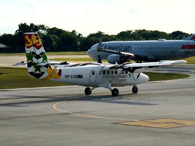 Cayman Airways Express Dash 6-300 departing GCM