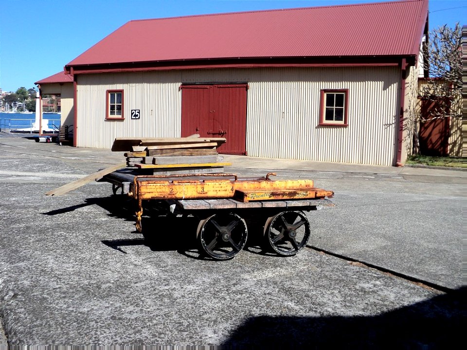 RAN Armament Depot Spectacle Island - Return store; hand-propelled tramway trolley in front.