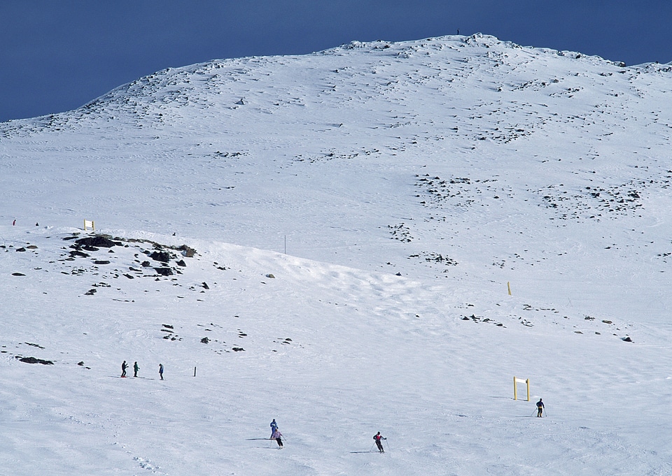 skier skiing on fresh powder snow