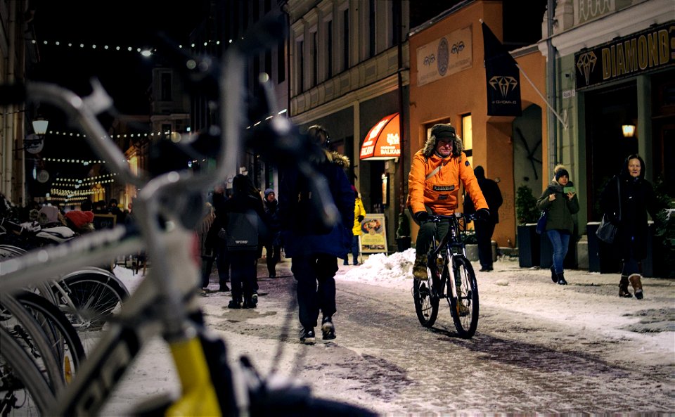 Man riding a bike photo