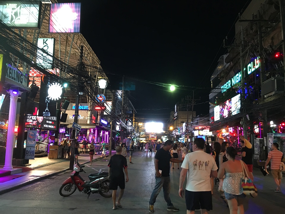 tourists are shopping at old town night market in Phuket photo