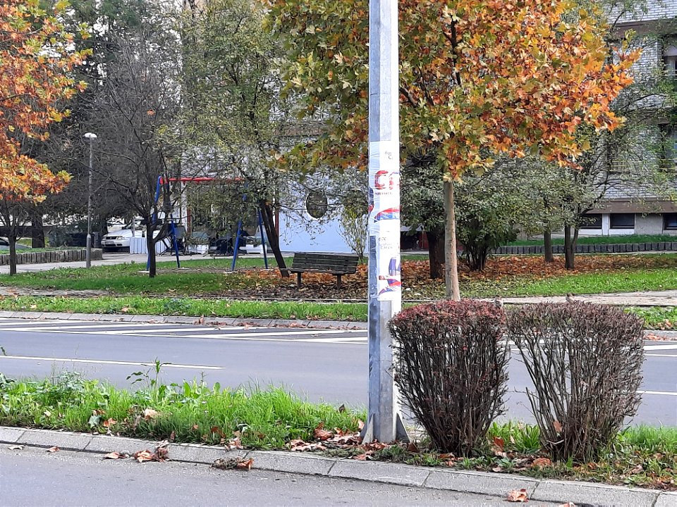 Posters on lamppost with candidates for councilors of Banja Luka's city assembly on East transit (Istočni tranzit) (1)