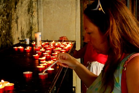 Candle Lighting at Santuario Madonna della Corona photo