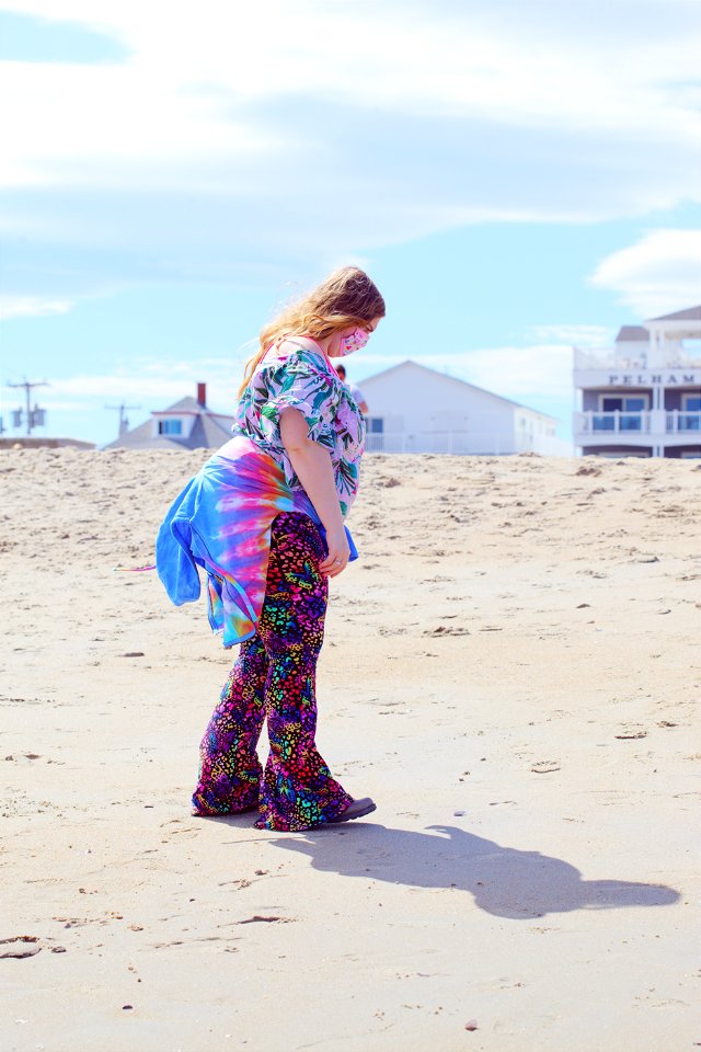 Colorful Woman Walking The Beach in April 2021 photo