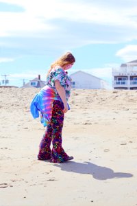 Colorful Woman Walking The Beach in April 2021 photo