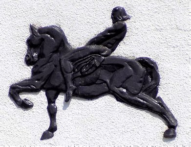 Rider on Horse, plaque on Burnetts' art deco flats, Inverness photo
