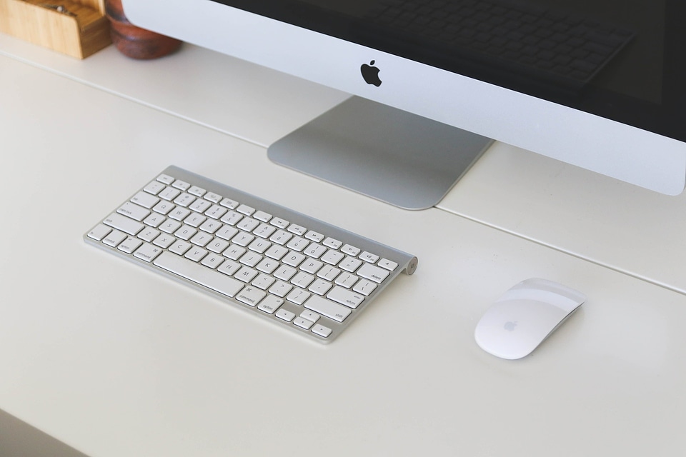 The monitor on a desk mockup poster. The working surface