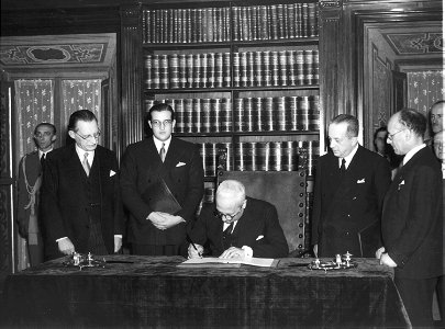 Enrico de Nicola signs the Italian's Constitution, 1947 photo