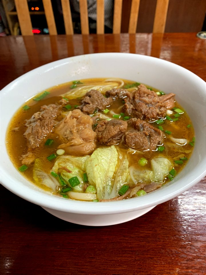 chinese beef soup with dumplings in Bangkok, Thailand photo