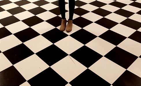 Black and white tile with legs