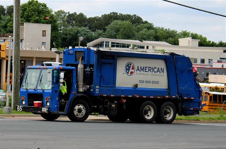 American Disposal truck 65 | Rebuilt LE Heil RL photo