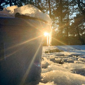 Ice bucket melting in the Sun photo