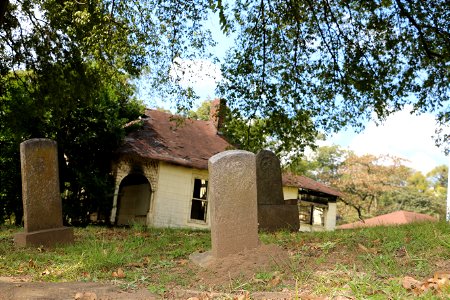 Some old gravestones near the old caretakers house, Oakwood  Cemetery