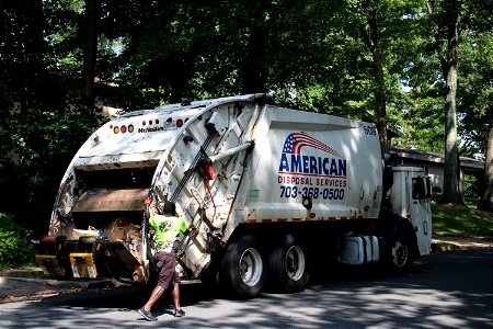 American Disposal truck 509 | Mack LEU McNeilus XC-RL photo