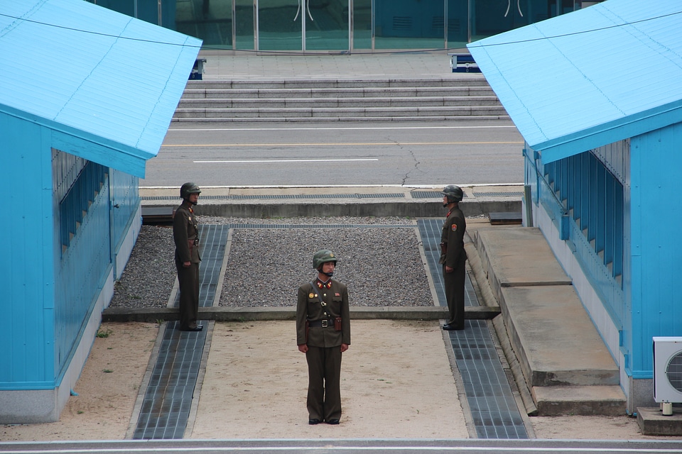 Guards looking across the border in the demilitarized zone