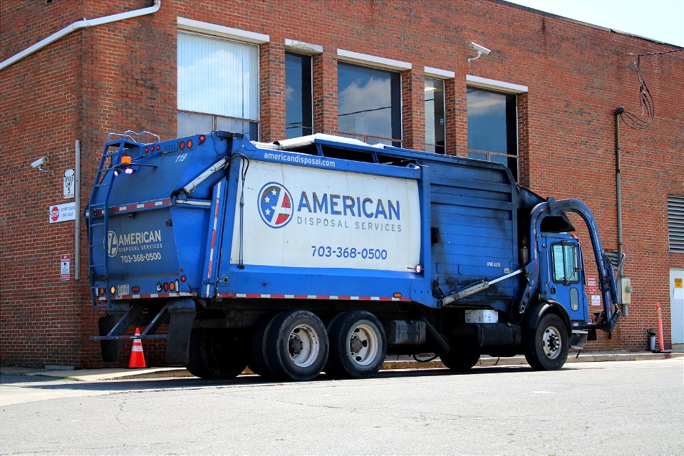American Disposal truck 119 | Mack MR Heil Half/Pack photo