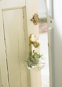 Door decorated with glass pot photo