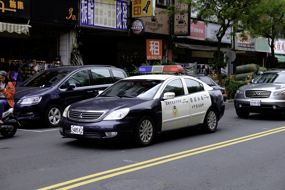 loseup view of police car at downtown of Shanghai