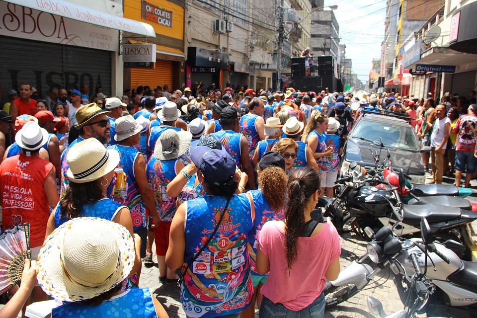 A group of girls in beautiful costumes are dancing at Festival