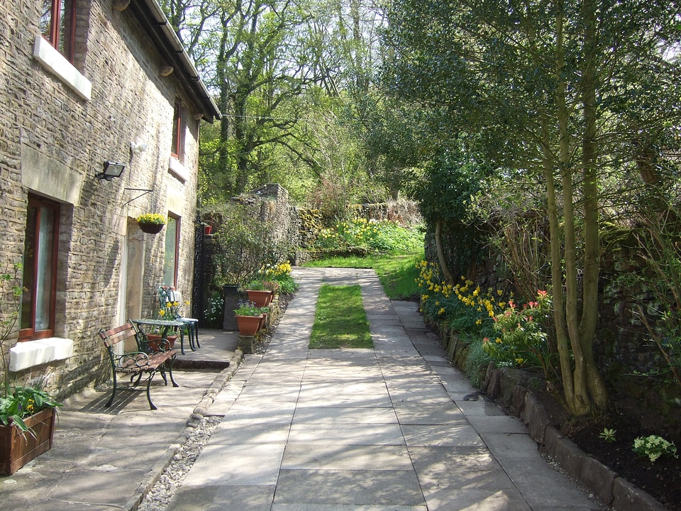 An authentic house with a stone gray wall