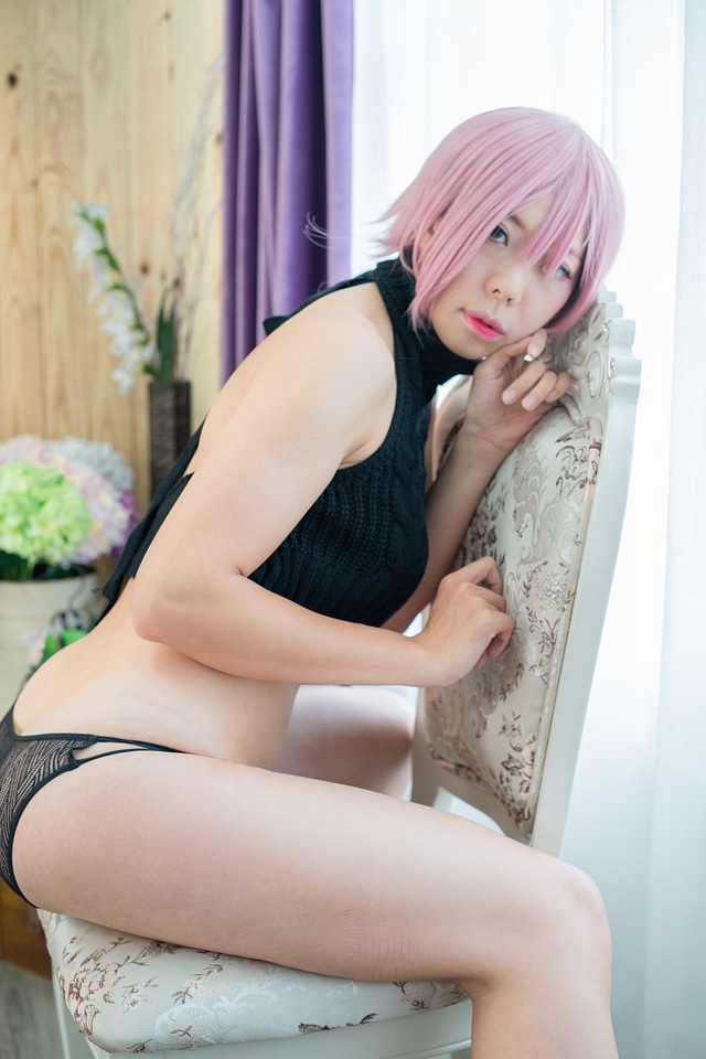 A young and sexy asian woman weared black bikini