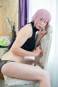 A young and sexy asian woman weared black bikini