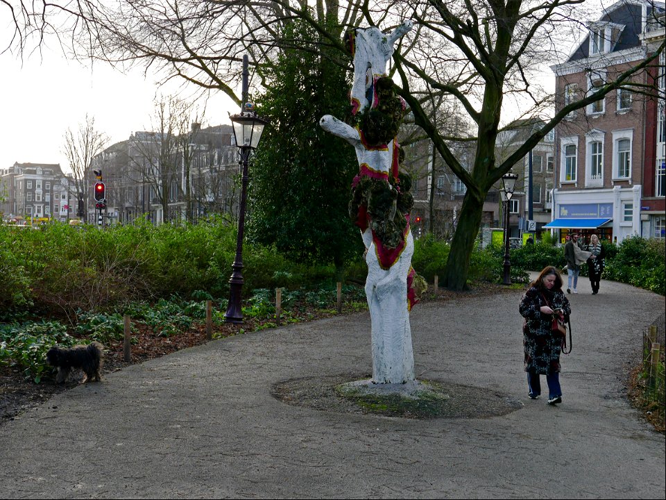 A painted tree in the park, Amsterdam city; free urban photo by Fons Heijnsbroek, 2022.