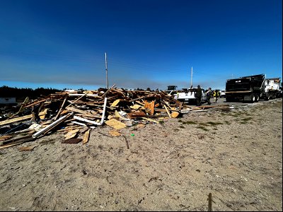 Piles of debris at Ramp 23 parking area collection site