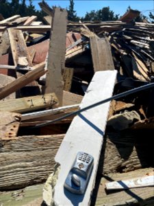 Collected debris associated with March 13 house collapse photo