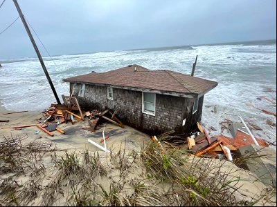 Photo of March 13, 2023, collapsed house at 23228 East Point Dr., Rodanthe photo