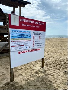 New lifeguard signs photo