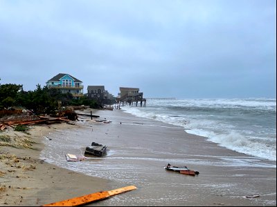 View of the beach south of a collapsed house site in Rodanthe 05-10-2022 photo