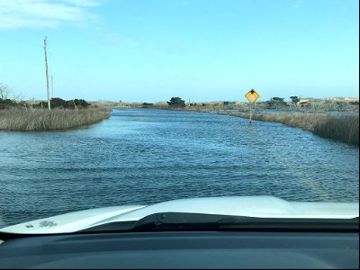Flooding along road exiting Cape Point Campground looking toward Lighthouse Road in Buxton 02-19-2021 photo