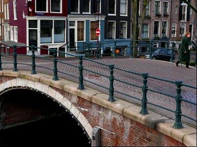Old brick canal bridge in Amsterdam city; free photo, Fons Heijnsbroek photo