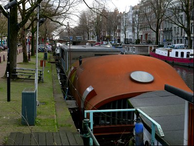 View over the canal Prinsengracht with houseboats, Amsterdam city, free photo Fons Heijnsbroek photo