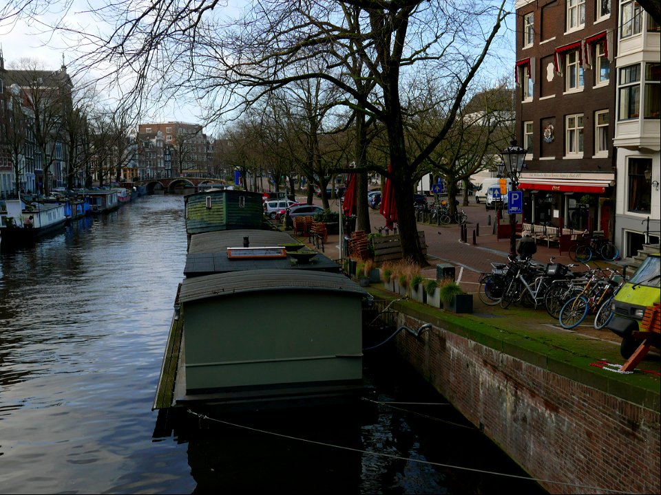 Canal-view in Amsterdam city with houseboats: Prinsengracht photo